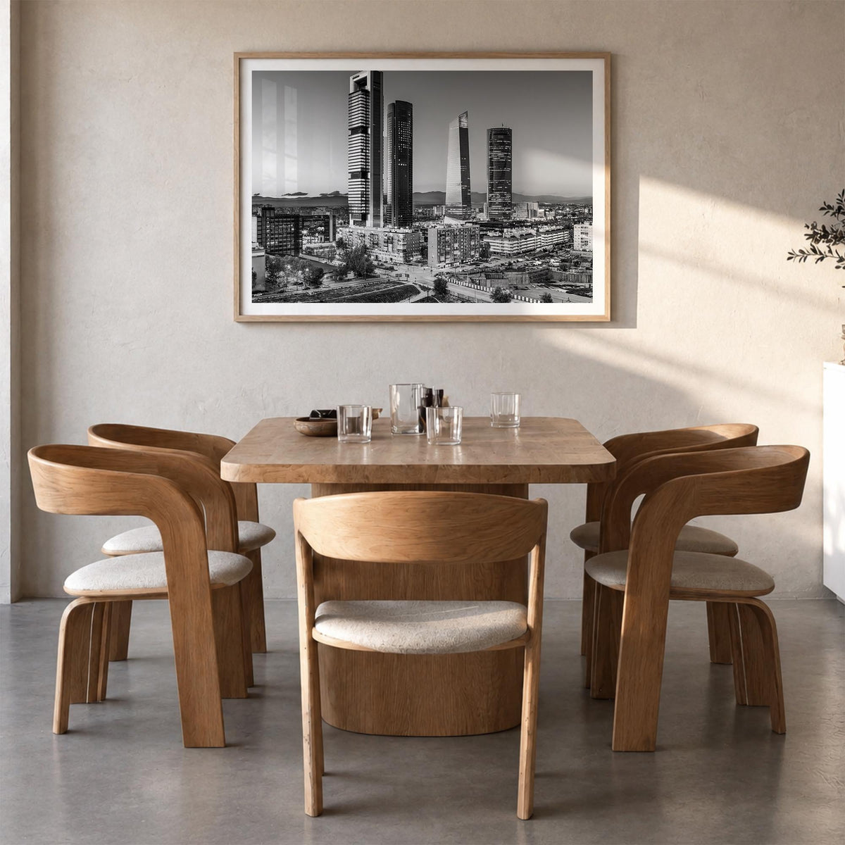 Madrid black & white photo poster of Spain – horizontal wall art in natural wood frame with white border, hanging on wall