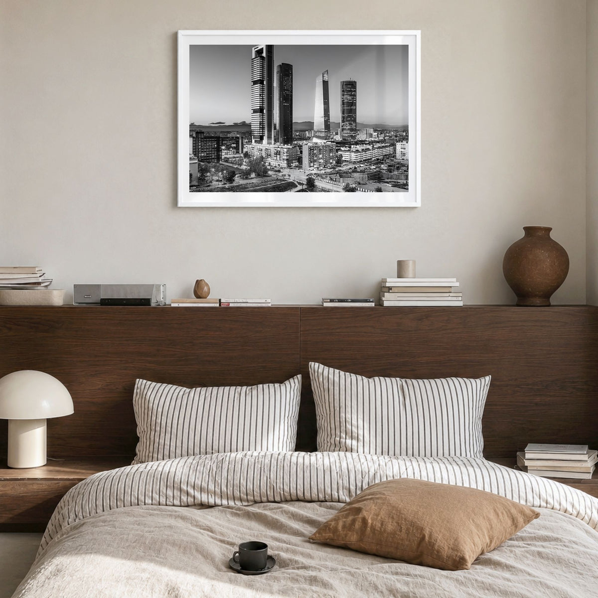 Madrid Photo Poster in a white wood frame, hanging in a bedroom, white border