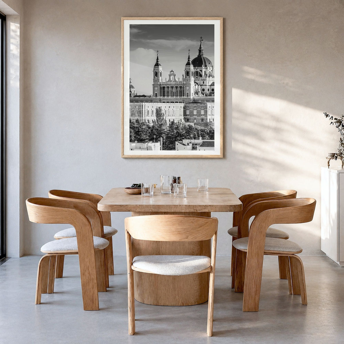 Madrid Photo No 1 Poster in a natural wood frame, hanging in a dining room, white border