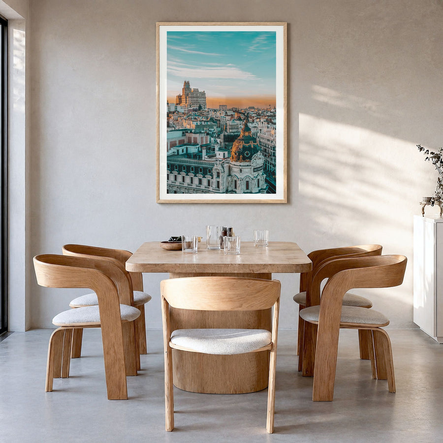 Madrid Photo No 2 Poster in a natural wood frame, hanging in a dining room, white border