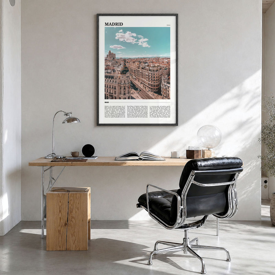 Madrid Travel Poster in a black wood frame, hanging in a bright home office