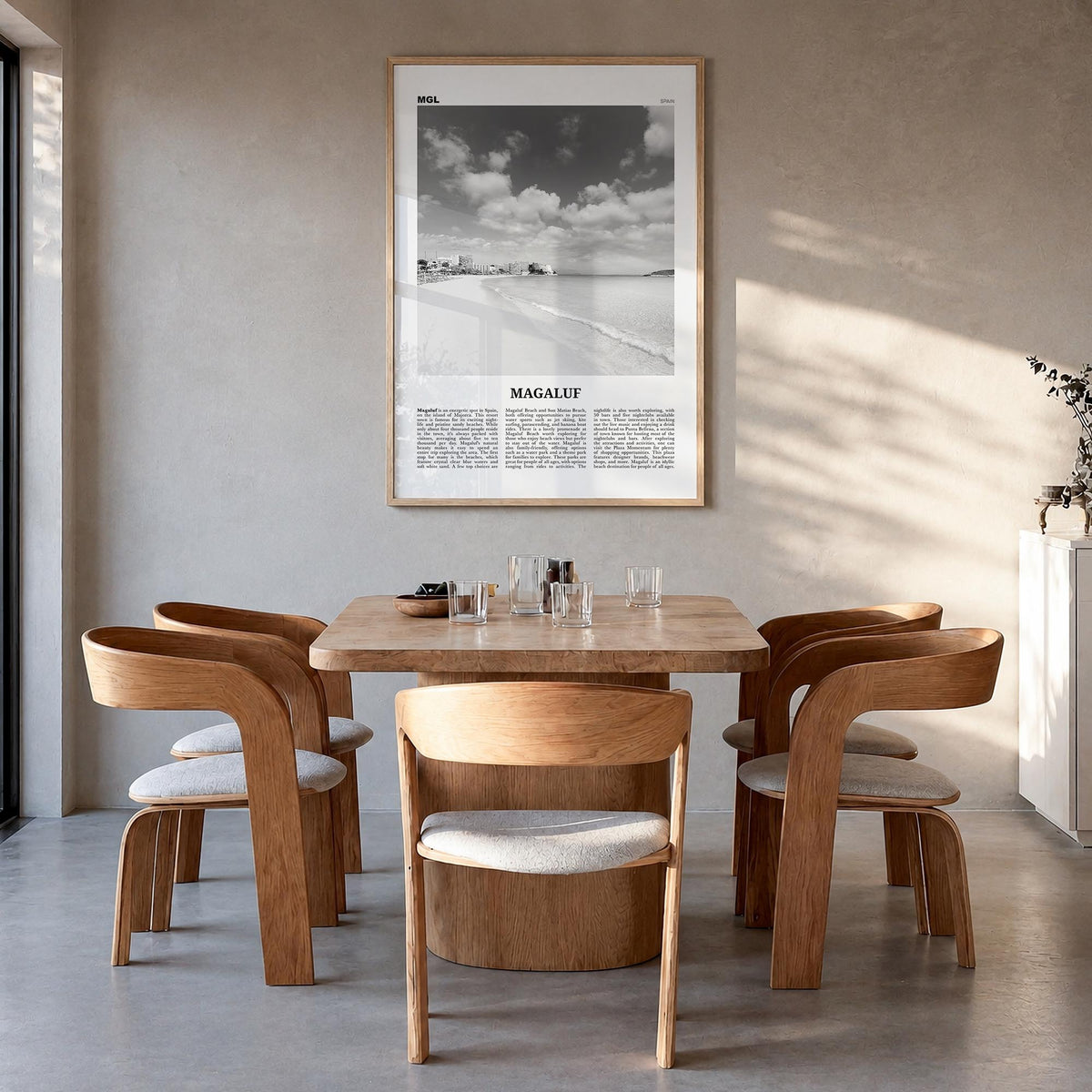 Magaluf black & white newspaper poster of Spain – vertical wall art in natural wood frame, hanging on wall