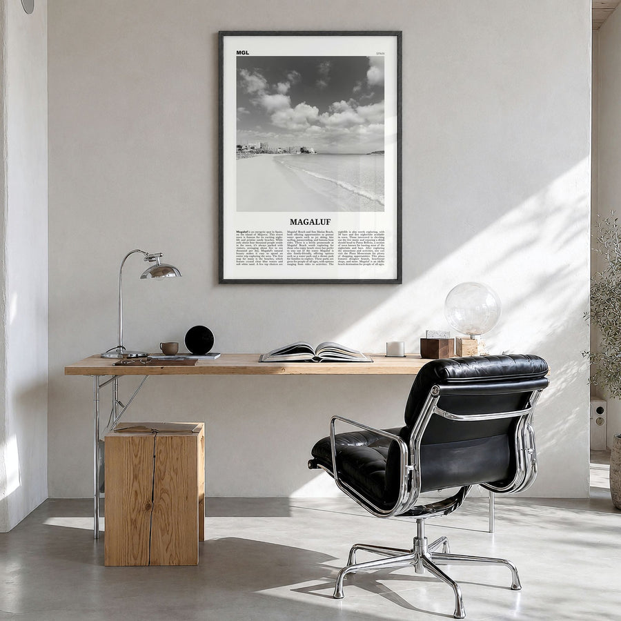 Magaluf Newspaper Poster in a black wood frame, hanging in a bright home office