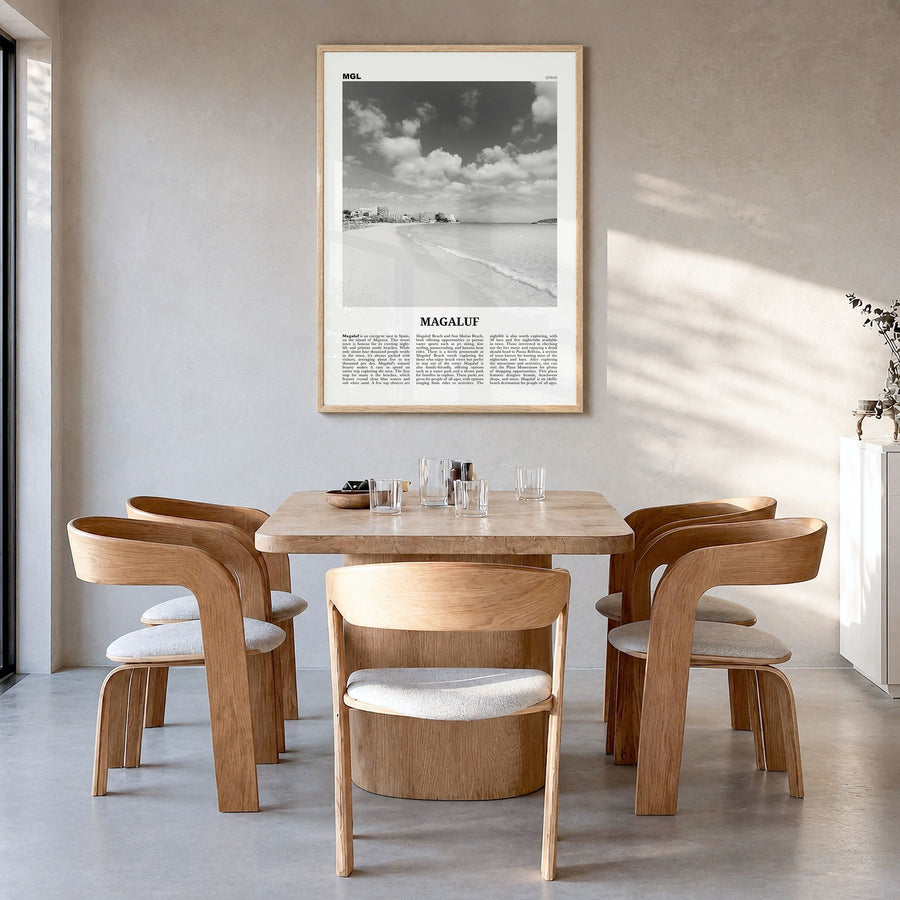 Magaluf Newspaper Poster in a natural wood frame, hanging in a dining room