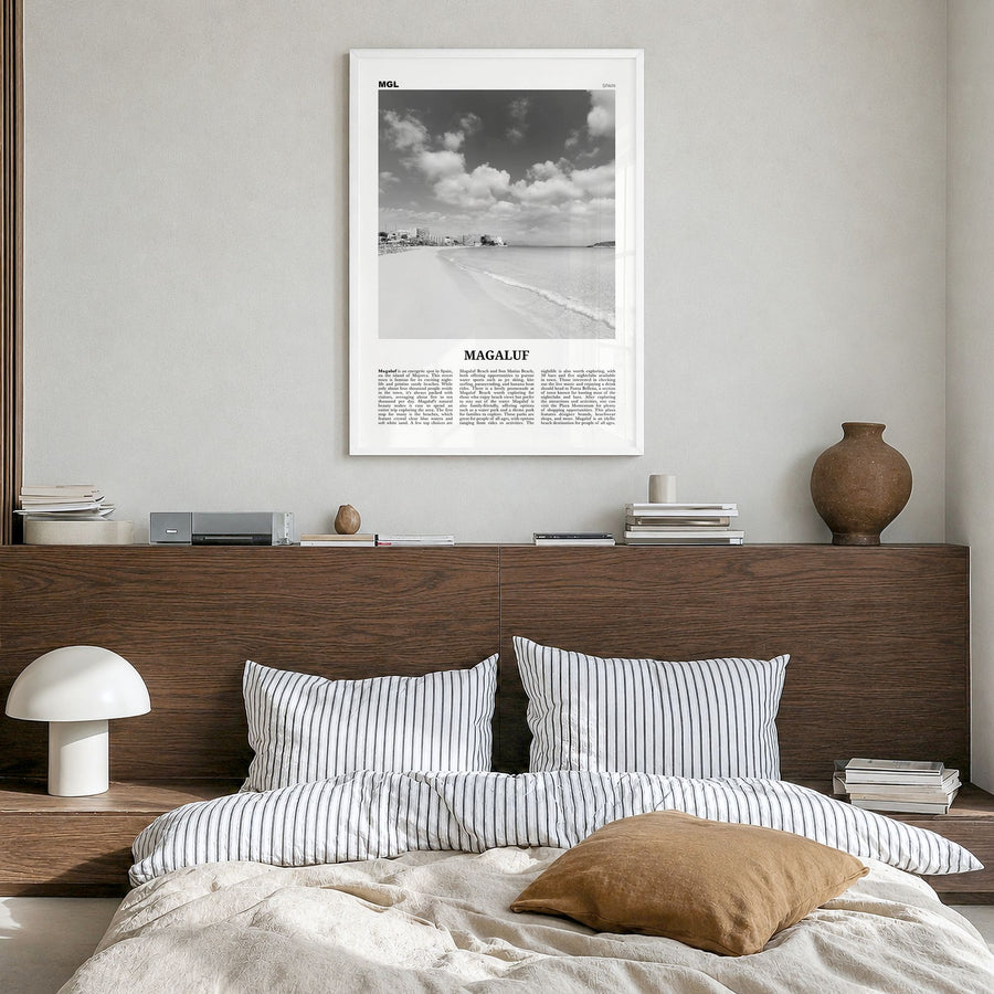 Magaluf Newspaper Poster in a white wood frame, hanging in a bedroom