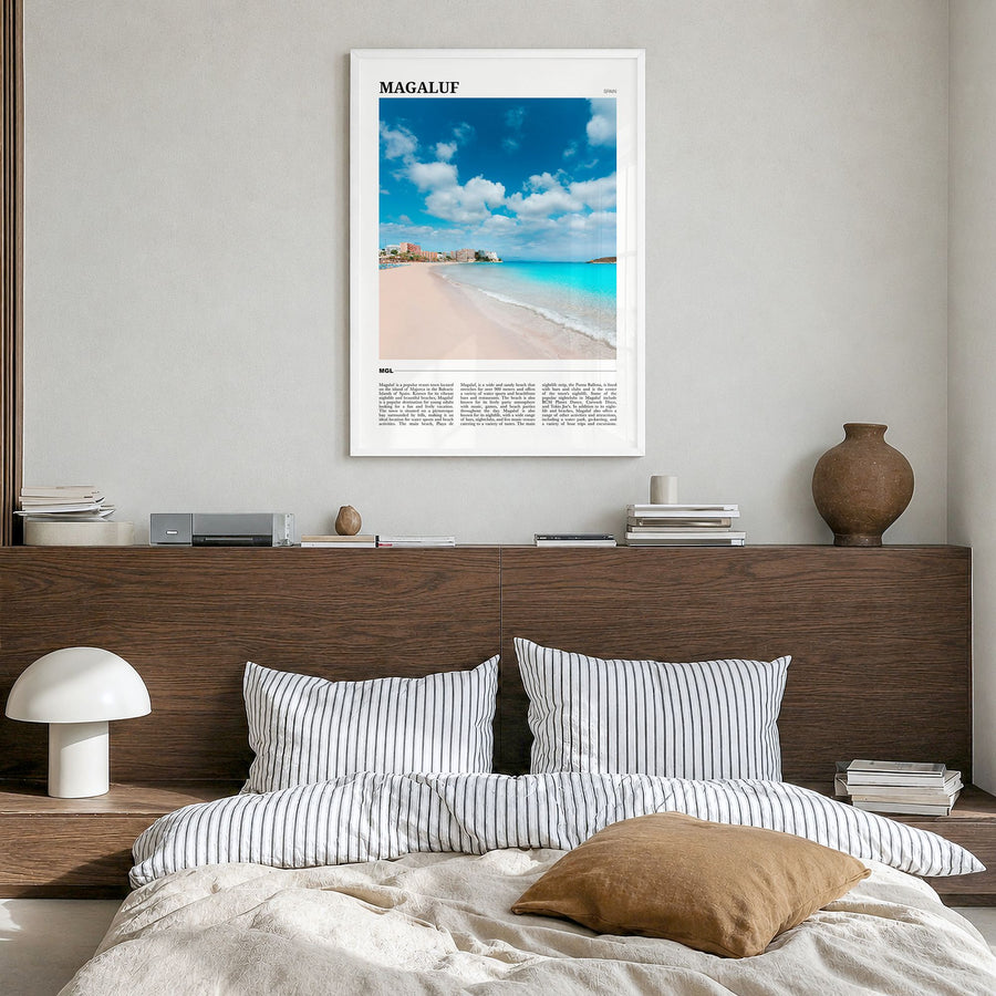 Magaluf Travel Poster in a white wood frame, hanging in a bedroom