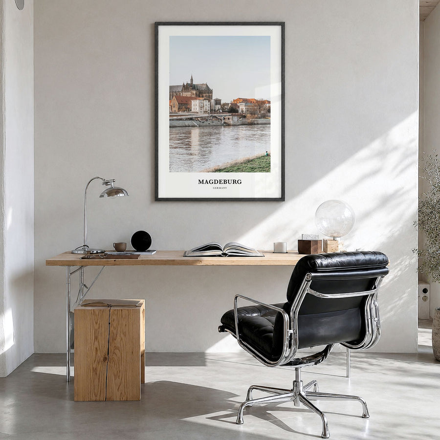 Magdeburg Classic No 2 Poster in a black wood frame, hanging in a bright home office