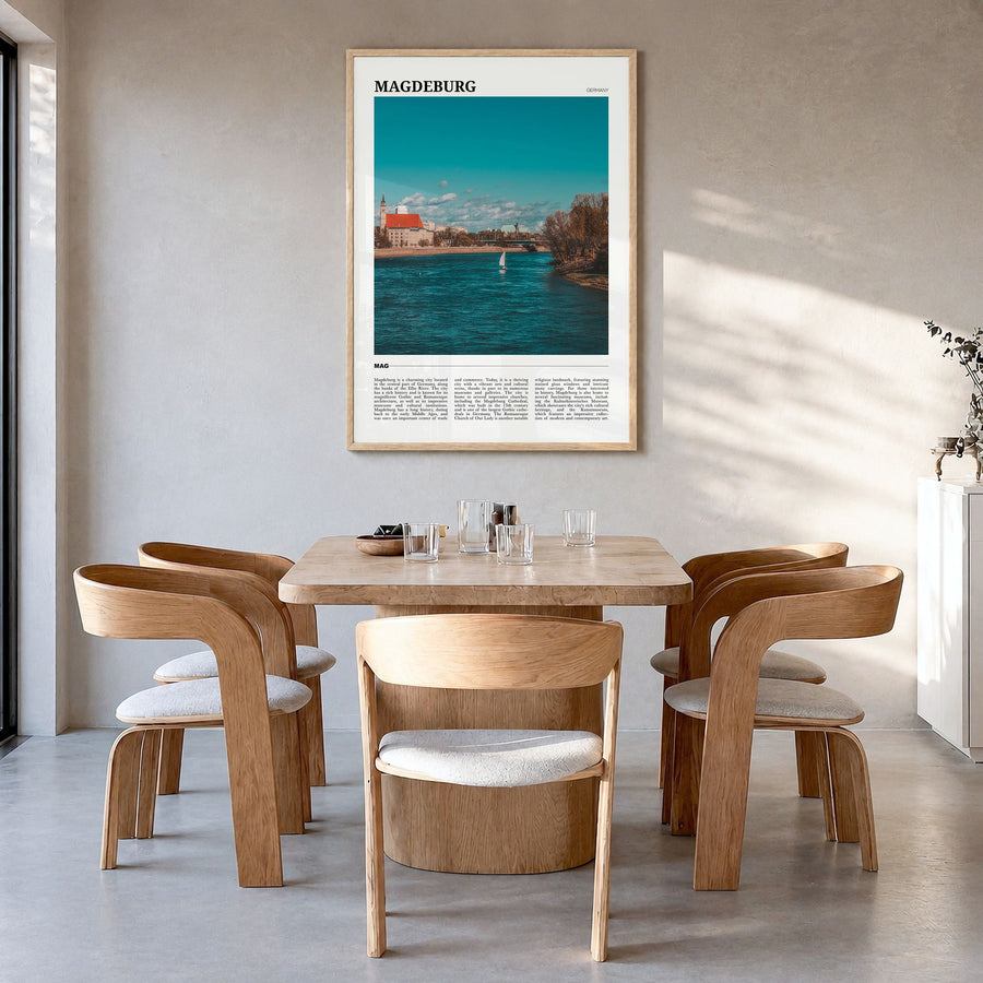 Magdeburg Travel No 1 Poster in a natural wood frame, hanging in a dining room