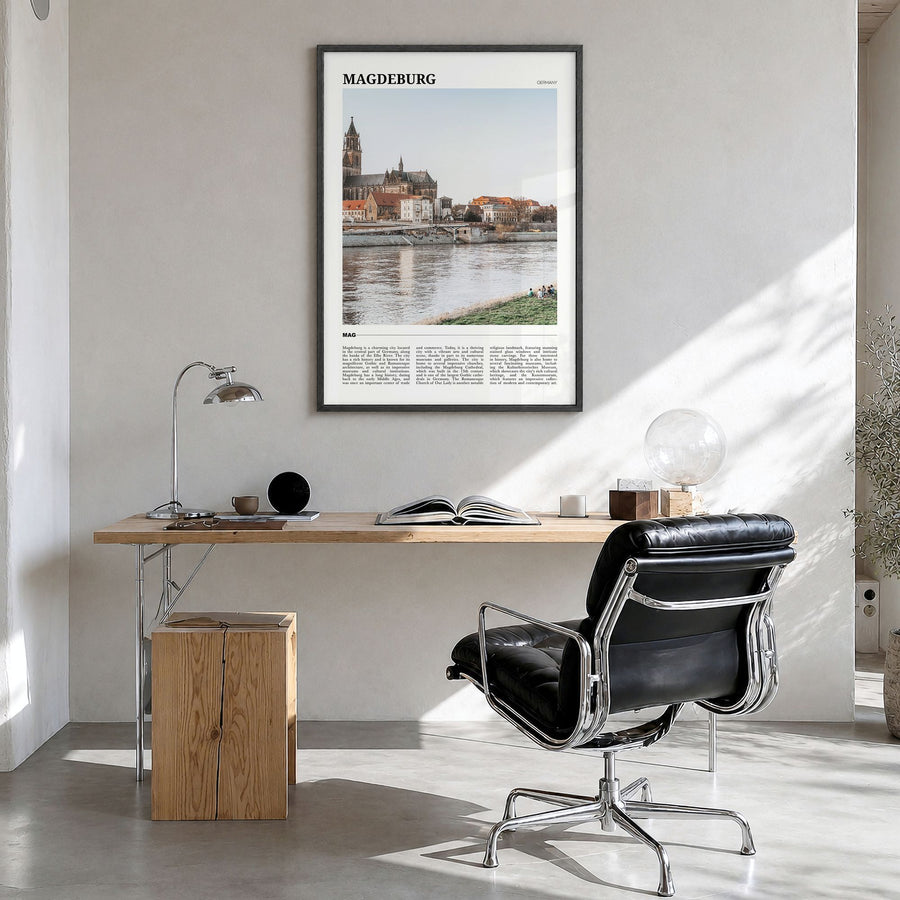 Magdeburg Travel No 2 Poster in a black wood frame, hanging in a bright home office
