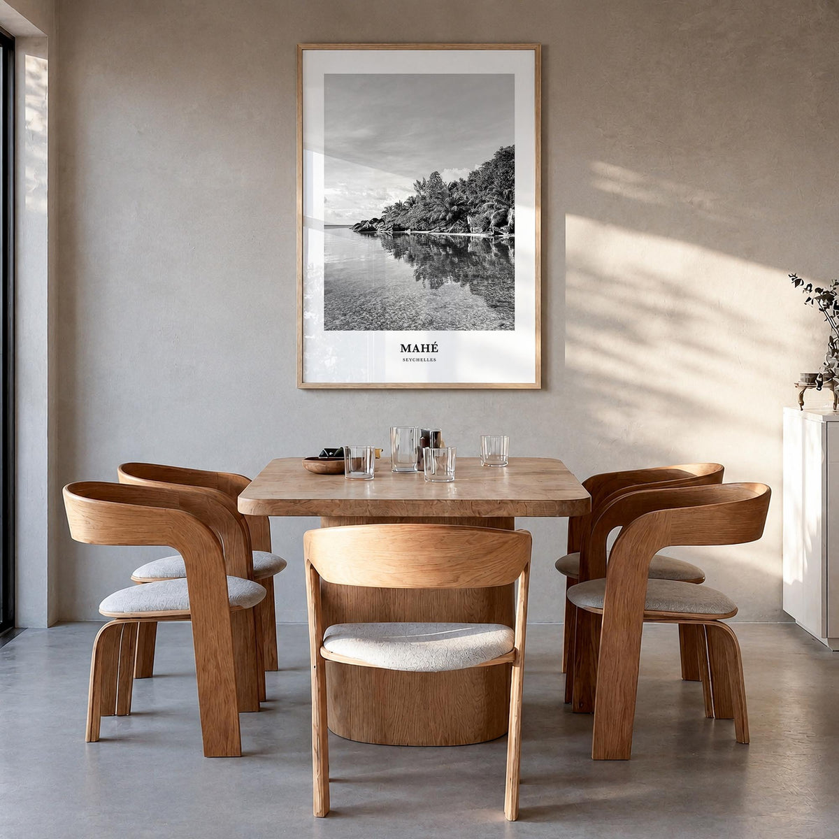 Mahé black & white classic poster of Seychelles – vertical wall art in natural wood frame, hanging on wall
