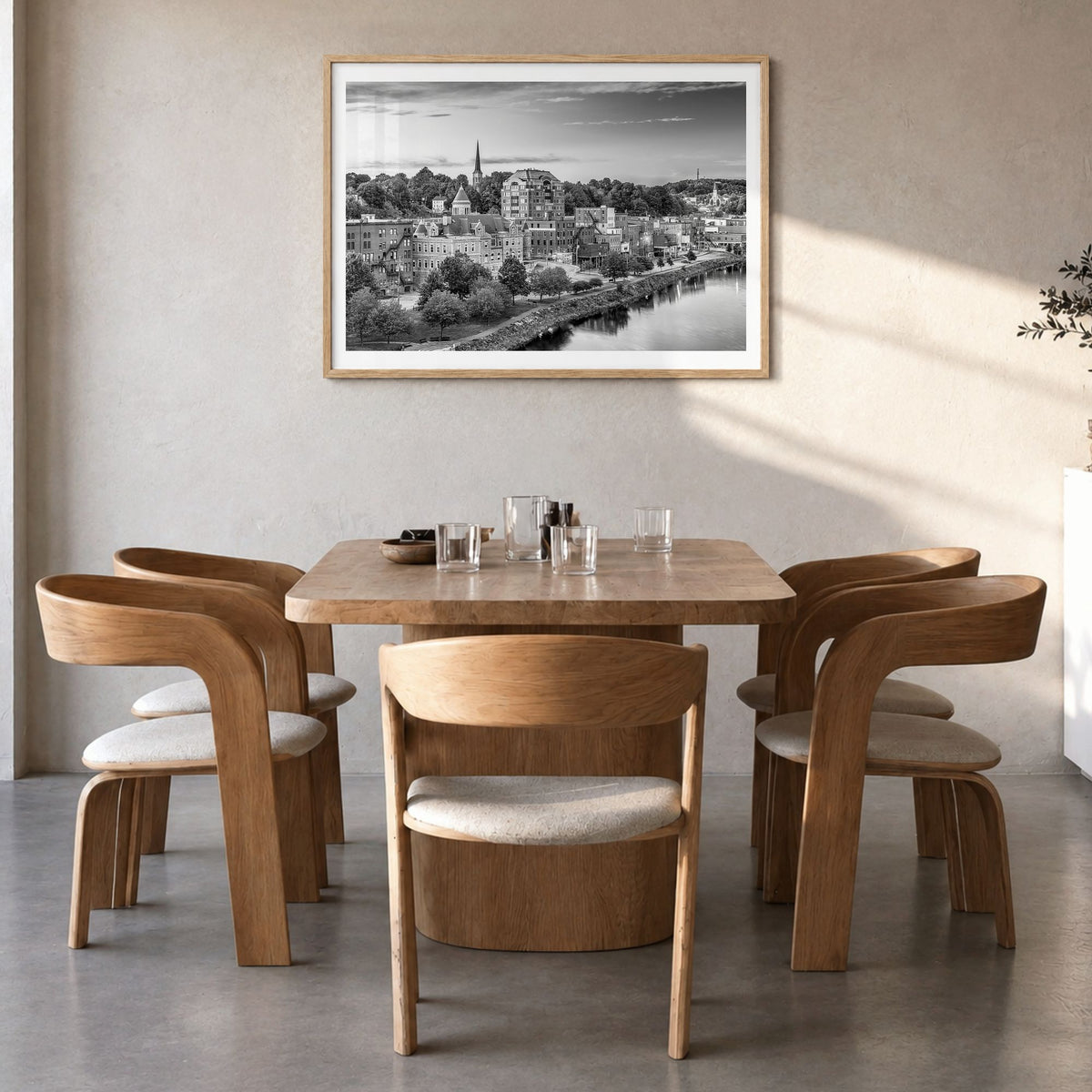 Maine Photo Poster in a natural wood frame, hanging in a dining room, white border