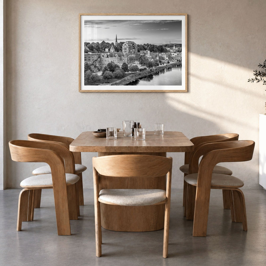 Maine Photo Poster in a natural wood frame, hanging in a dining room, white border