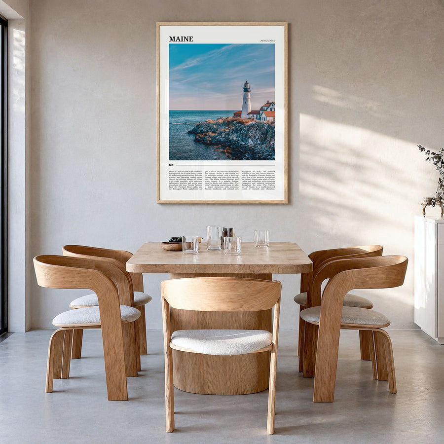 Maine Travel No 1 Poster in a natural wood frame, hanging in a dining room