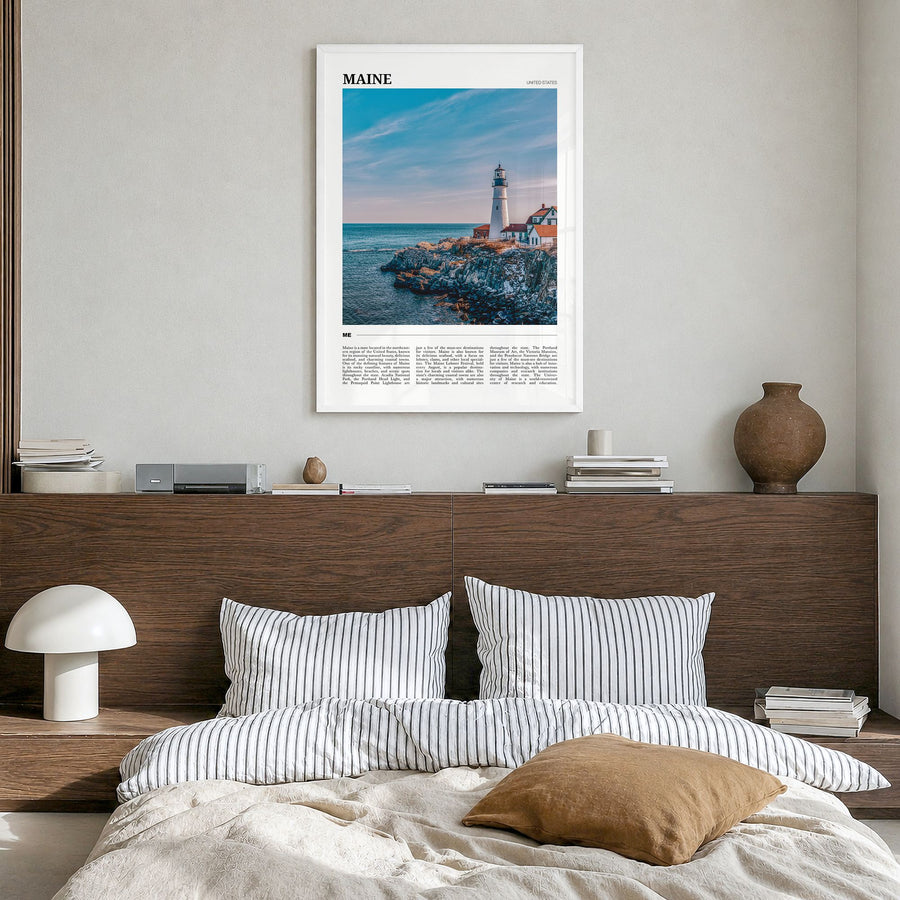 Maine Travel No 1 Poster in a white wood frame, hanging in a bedroom