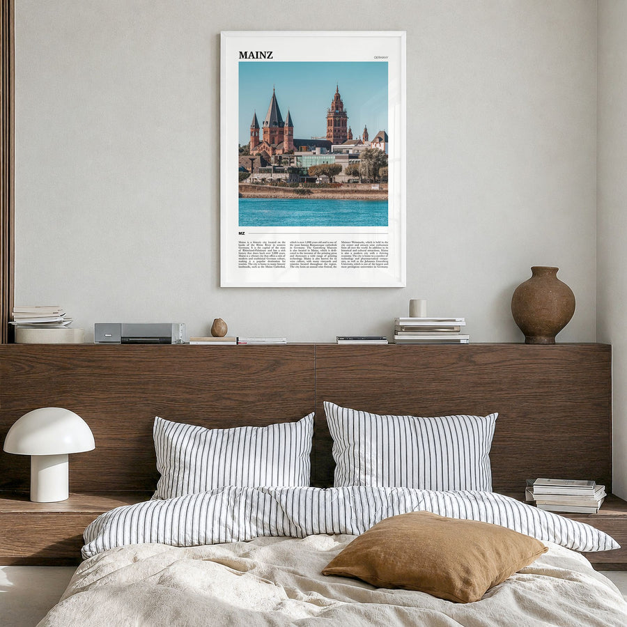 Mainz Travel Poster in a white wood frame, hanging in a bedroom