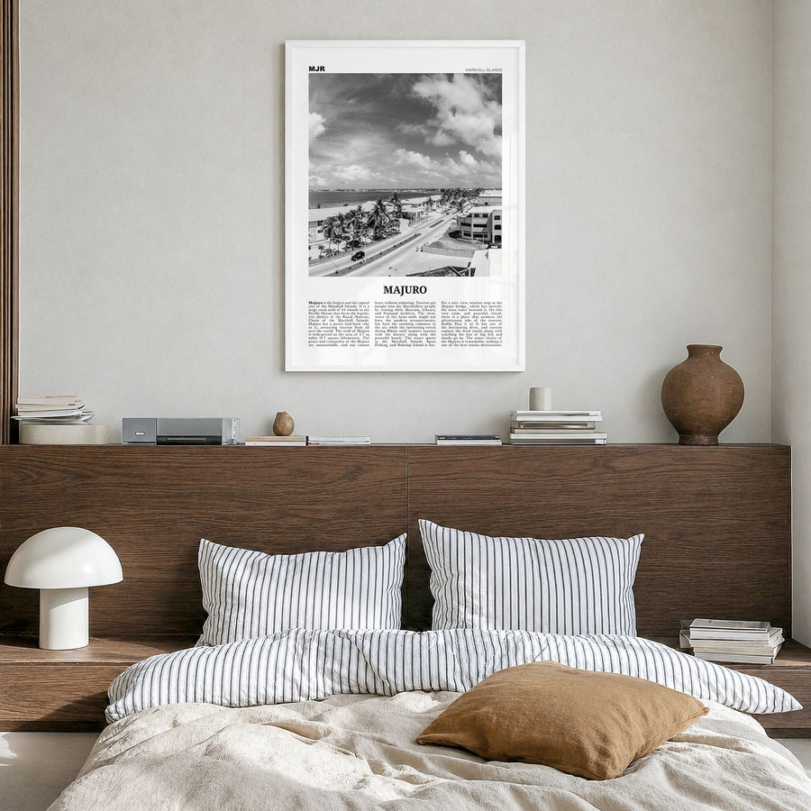 Majuro Newspaper Poster in a white wood frame, hanging in a bedroom