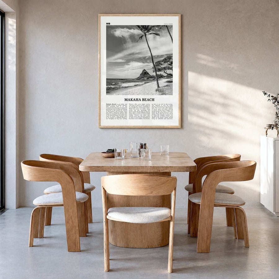 Makaha Beach Newspaper Poster in a natural wood frame, hanging in a dining room
