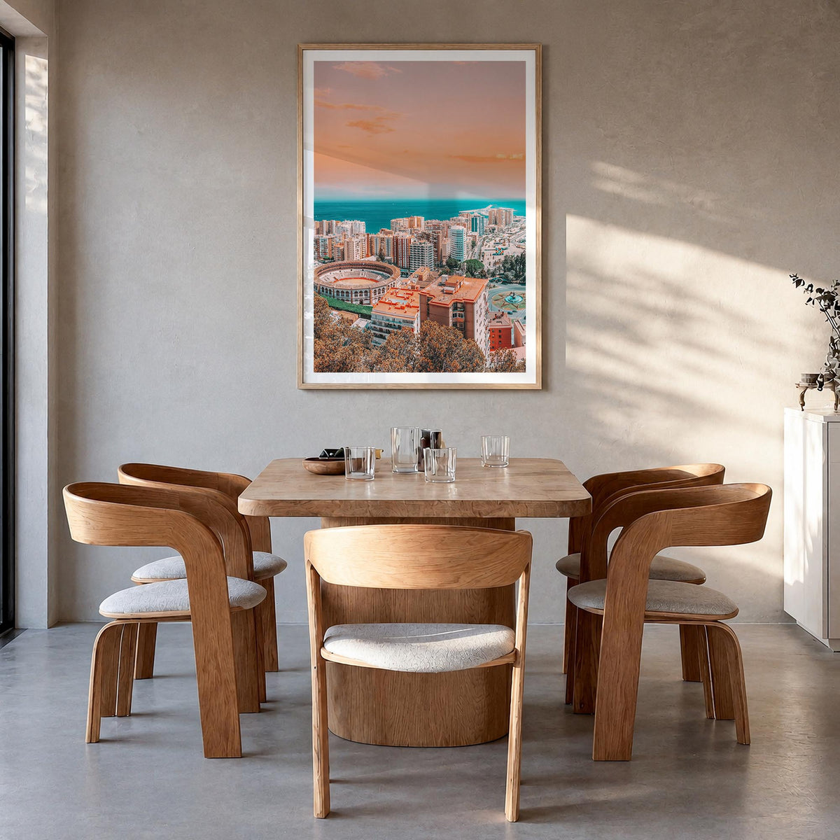 Málaga colorful photo poster of Spain – vertical wall art in natural wood frame with white border, hanging on wall