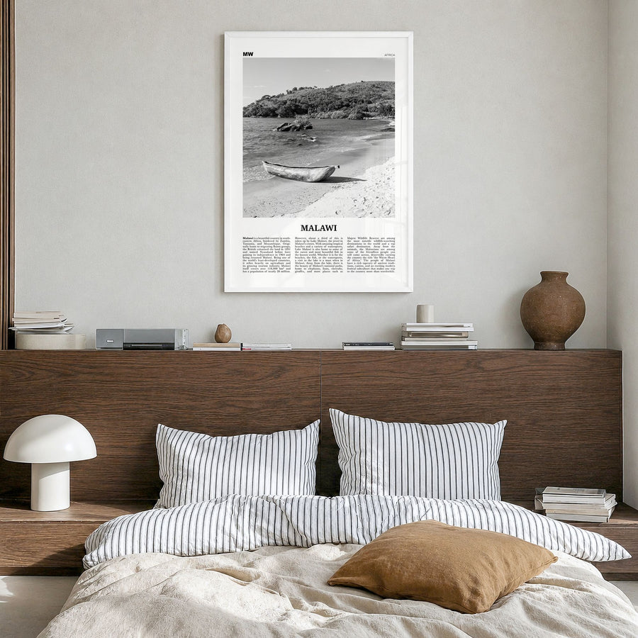 Malawi Newspaper Poster in a white wood frame, hanging in a bedroom