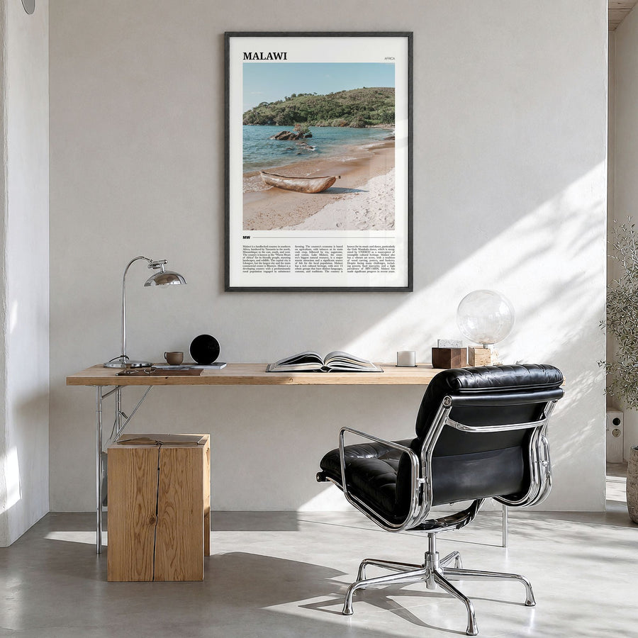 Malawi Travel Poster in a black wood frame, hanging in a bright home office