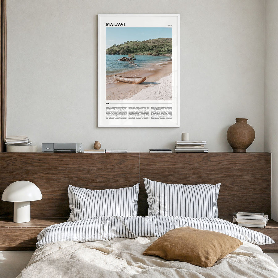 Malawi Travel Poster in a white wood frame, hanging in a bedroom