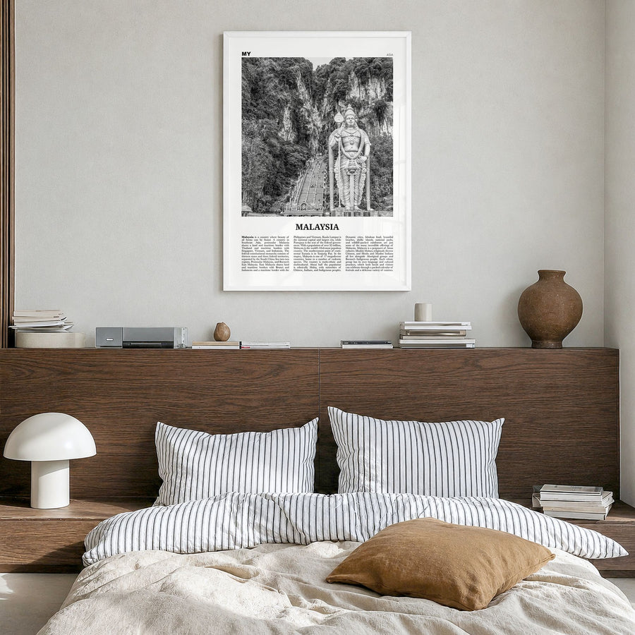Malaysia Newspaper Poster in a white wood frame, hanging in a bedroom