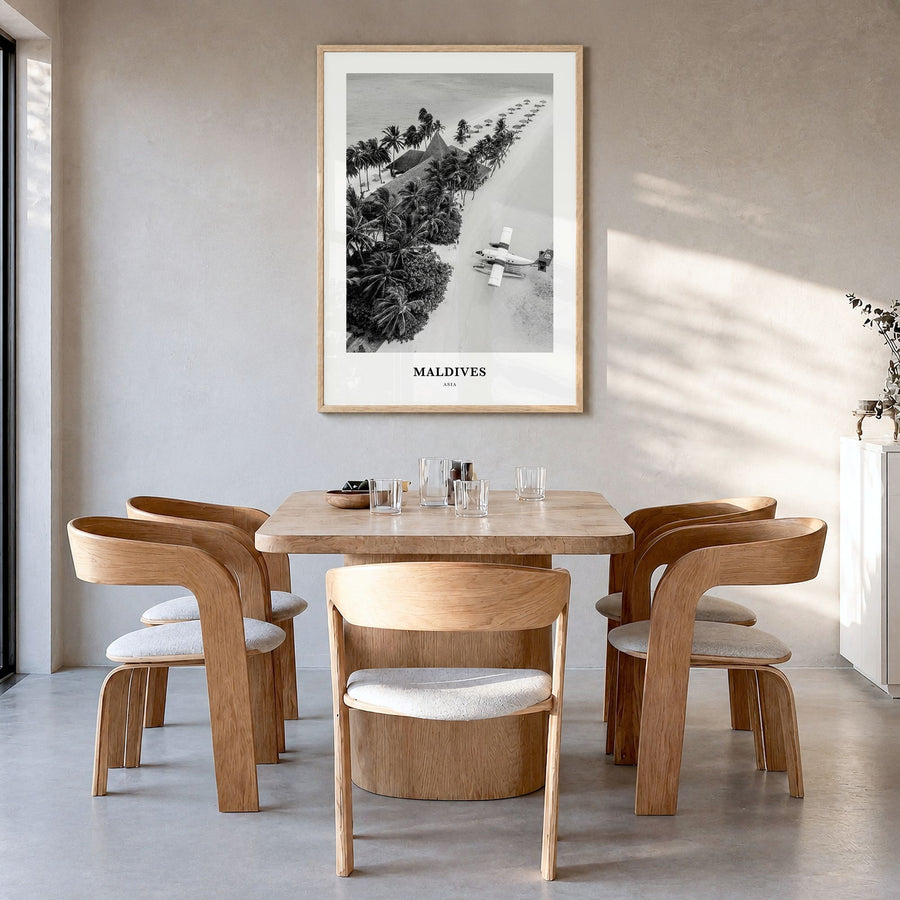 Maldives Classic No 3 Poster in a natural wood frame, hanging in a dining room