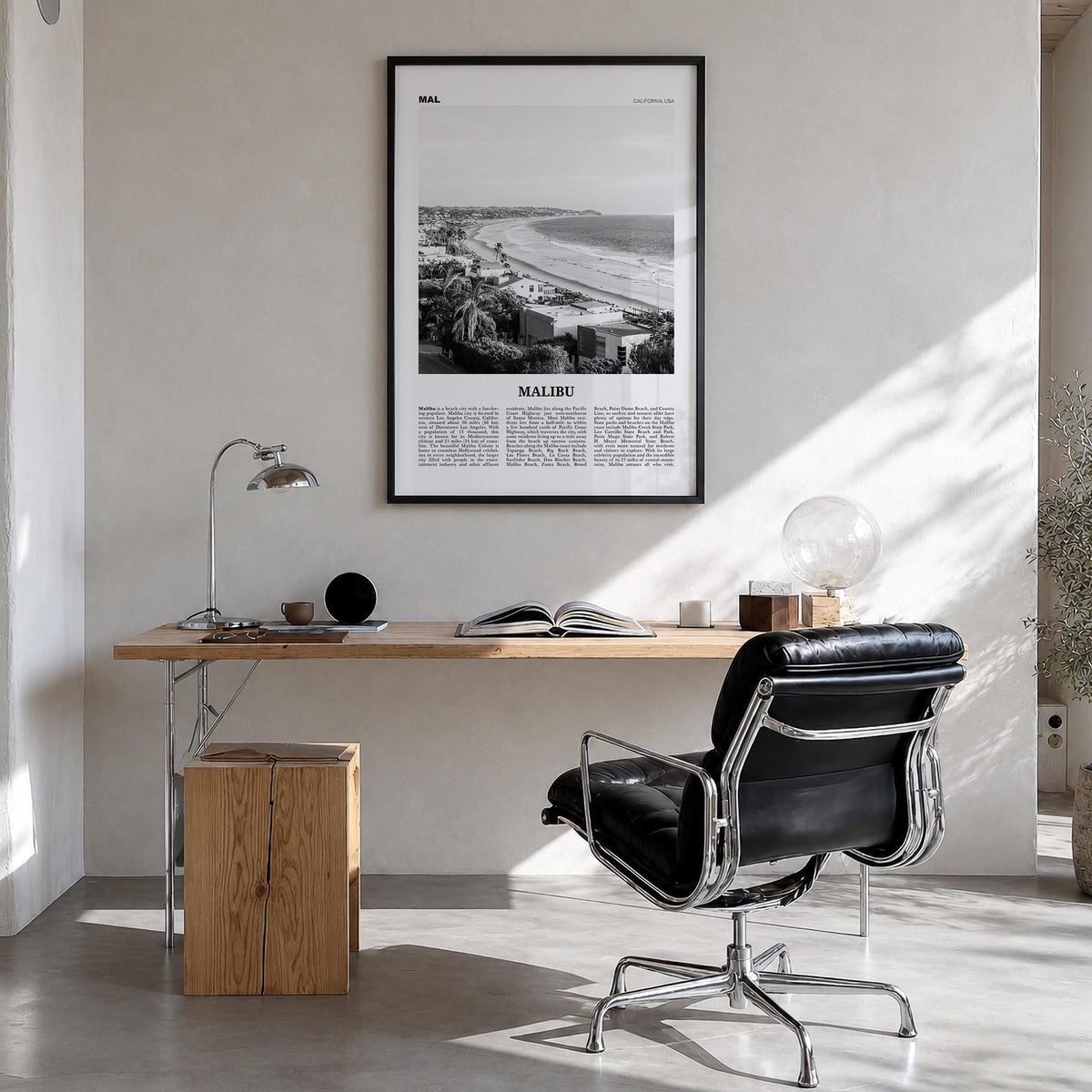 Malibu no. 2 black & white newspaper poster of California, USA – vertical wall art in black wood frame, hanging on wall
