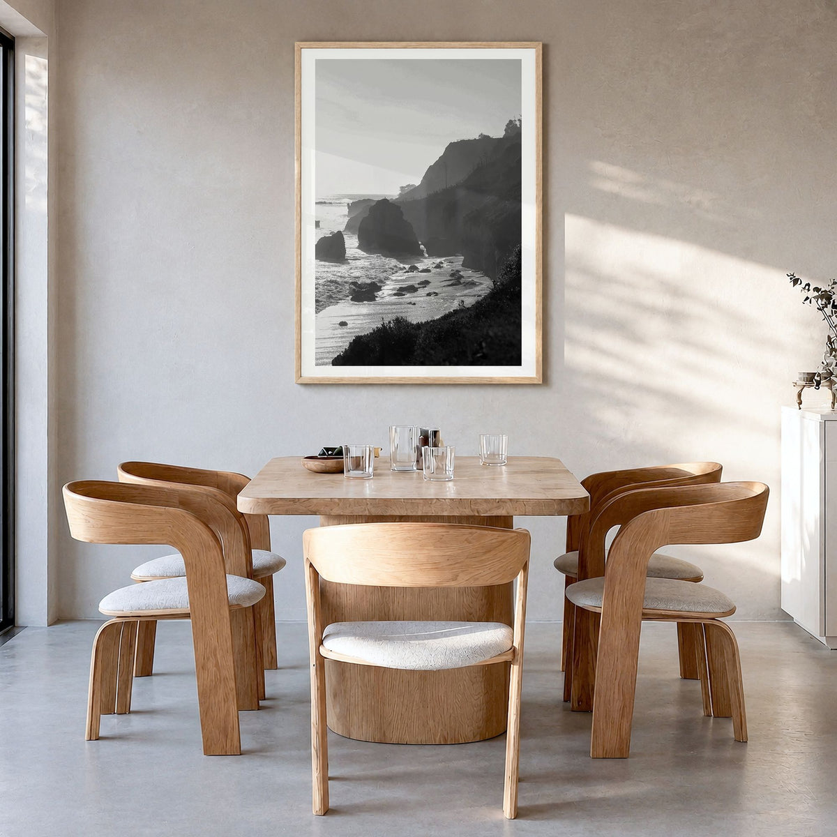 Malibu Photo No 2 Poster in a natural wood frame, hanging in a dining room, white border