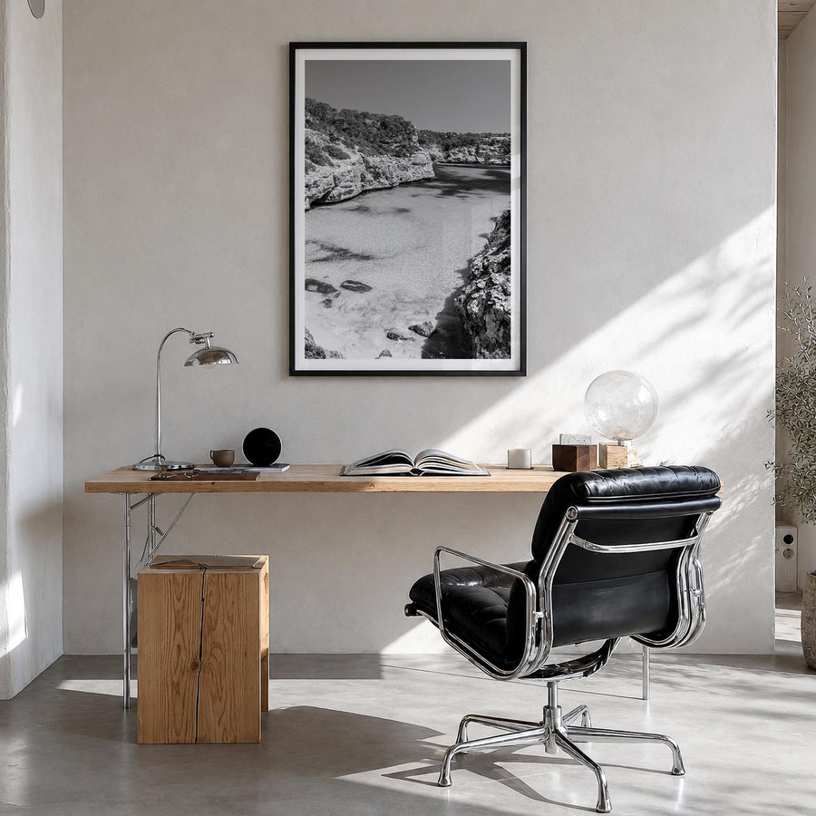 Mallorca black & white photo poster of Spain – vertical wall art in black wood frame with white border, hanging on wall