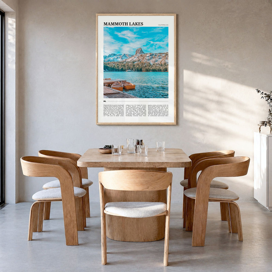 Mammoth Lakes Travel Poster in a natural wood frame, hanging in a dining room
