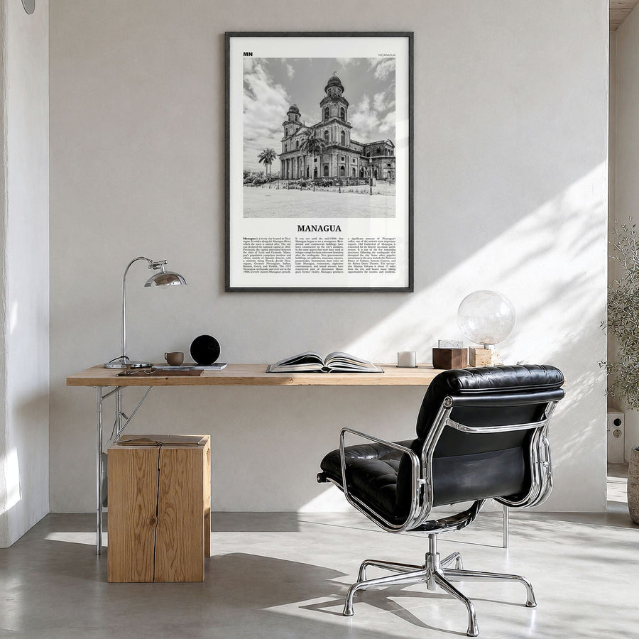 Managua Newspaper Poster in a black wood frame, hanging in a bright home office