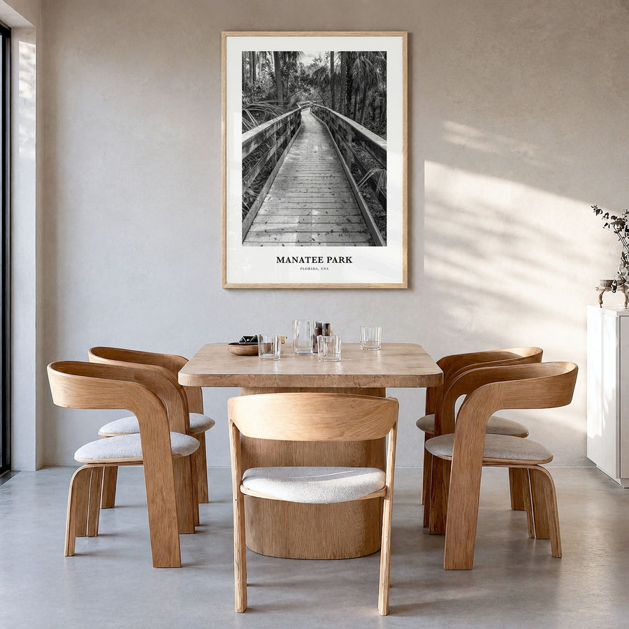 Manatee Park Classic Poster in a natural wood frame, hanging in a dining room
