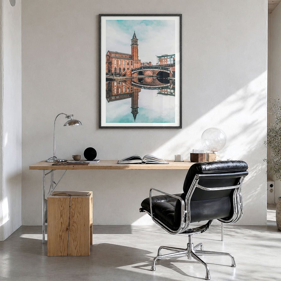 Manchester, England Photo No 2 Poster in a black wood frame, hanging in a bright home office, white border