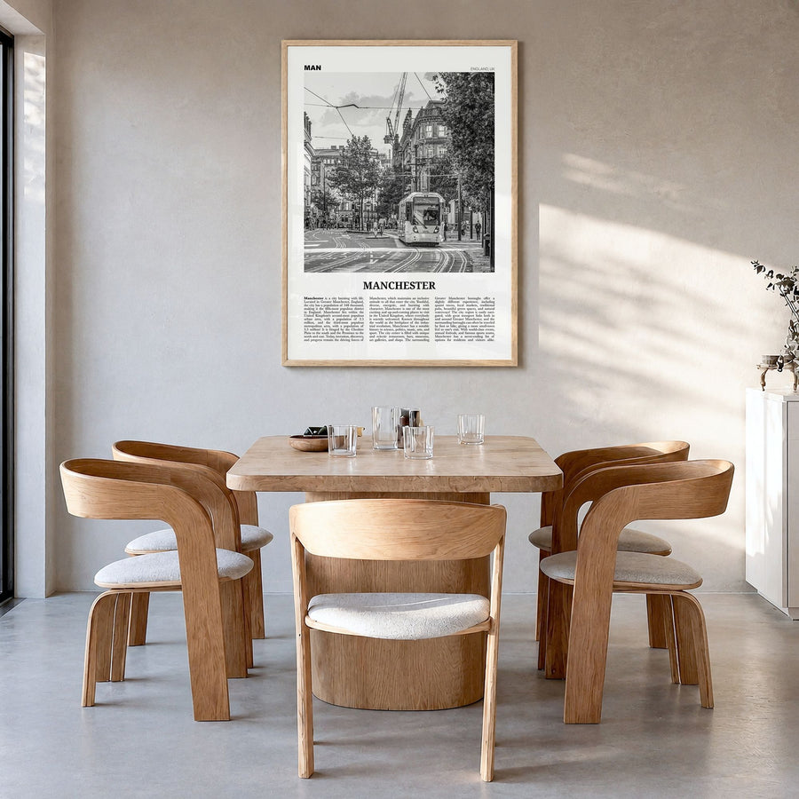 Manchester, England Newspaper No 1 Poster in a natural wood frame, hanging in a dining room