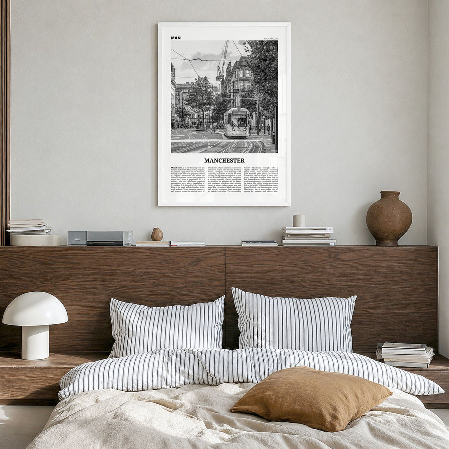 Manchester, England Newspaper No 1 Poster in a white wood frame, hanging in a bedroom