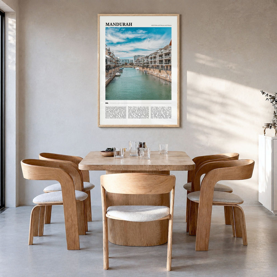 Mandurah Travel Poster in a natural wood frame, hanging in a dining room