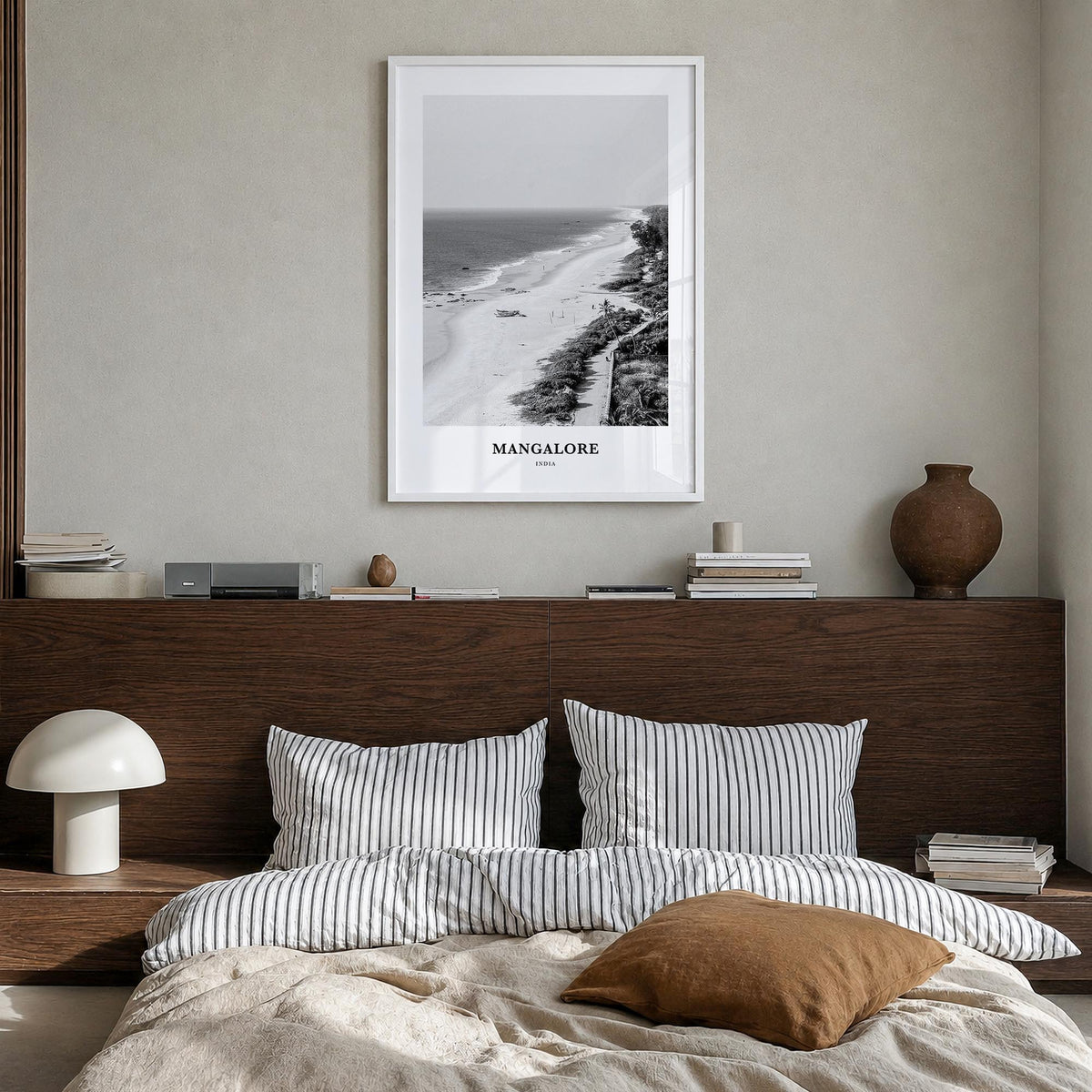 Mangalore black & white classic poster of India – vertical wall art in white wood frame, hanging on wall