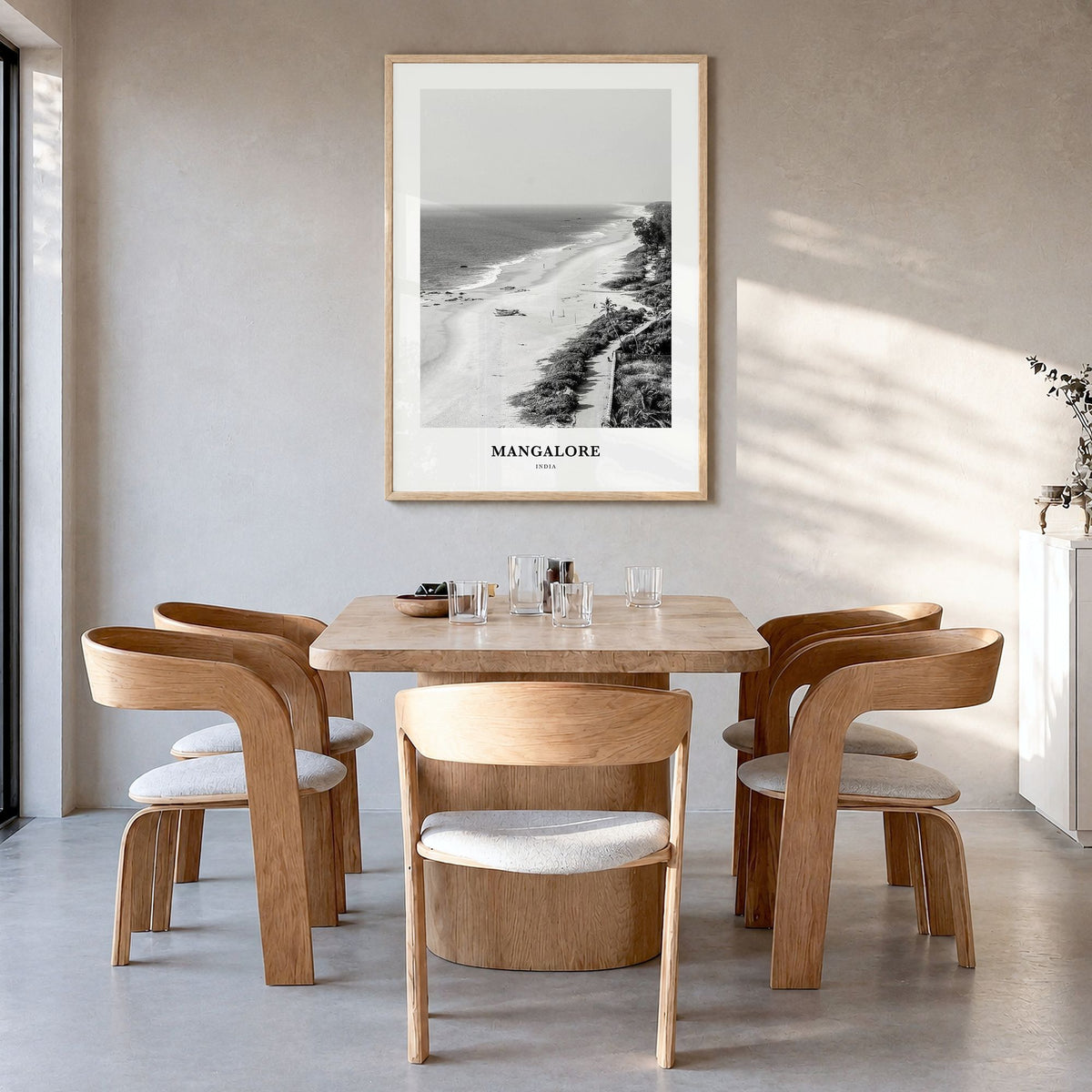 Mangalore Classic Poster in a natural wood frame, hanging in a dining room