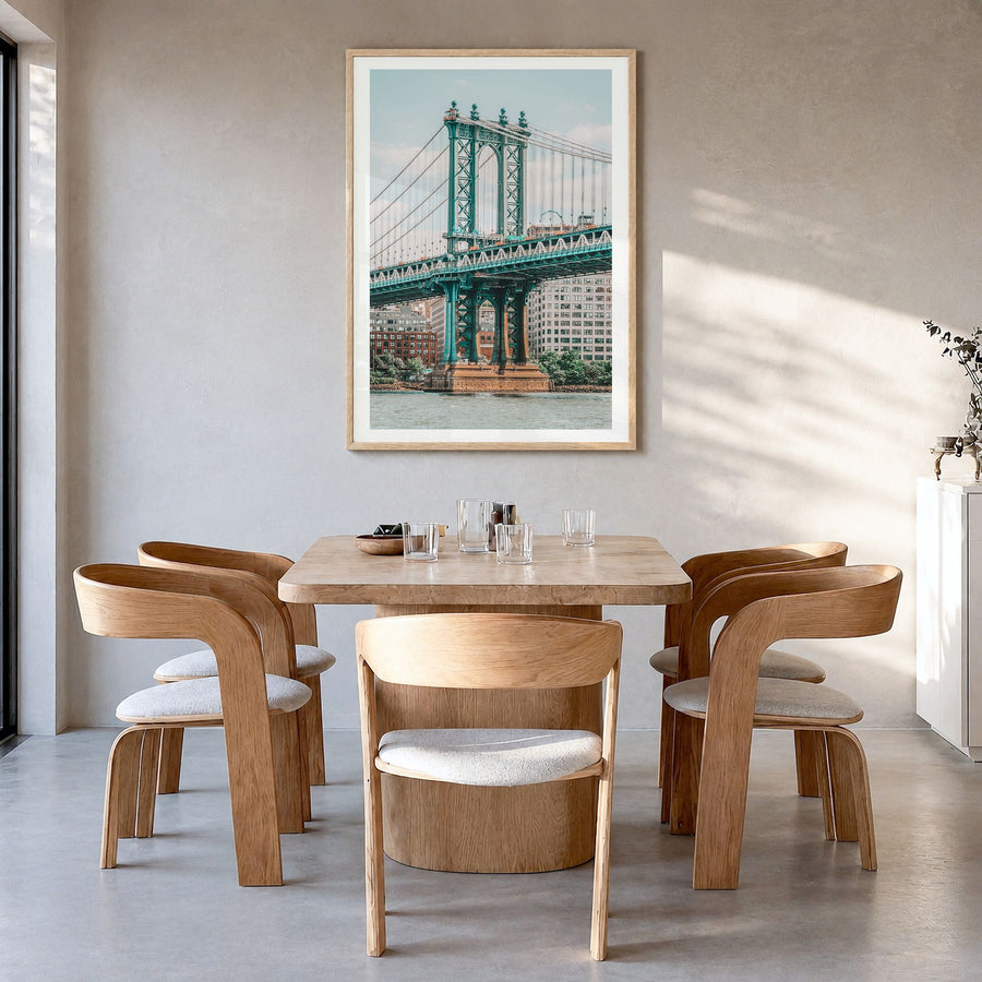 Manhattan Bridge Photo No 1 Poster in a natural wood frame, hanging in a dining room, white border