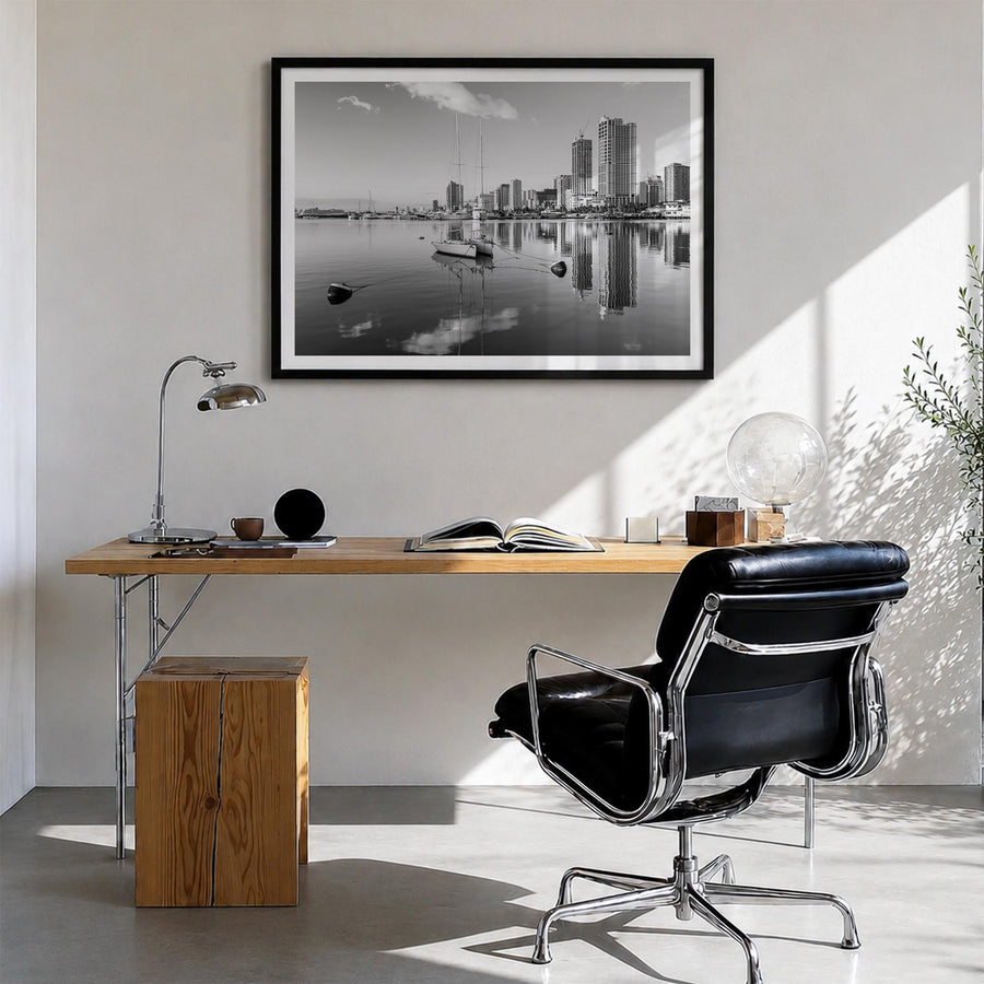 Manila black & white photo poster of Philippines – horizontal wall art in black wood frame with white border, hanging on wall