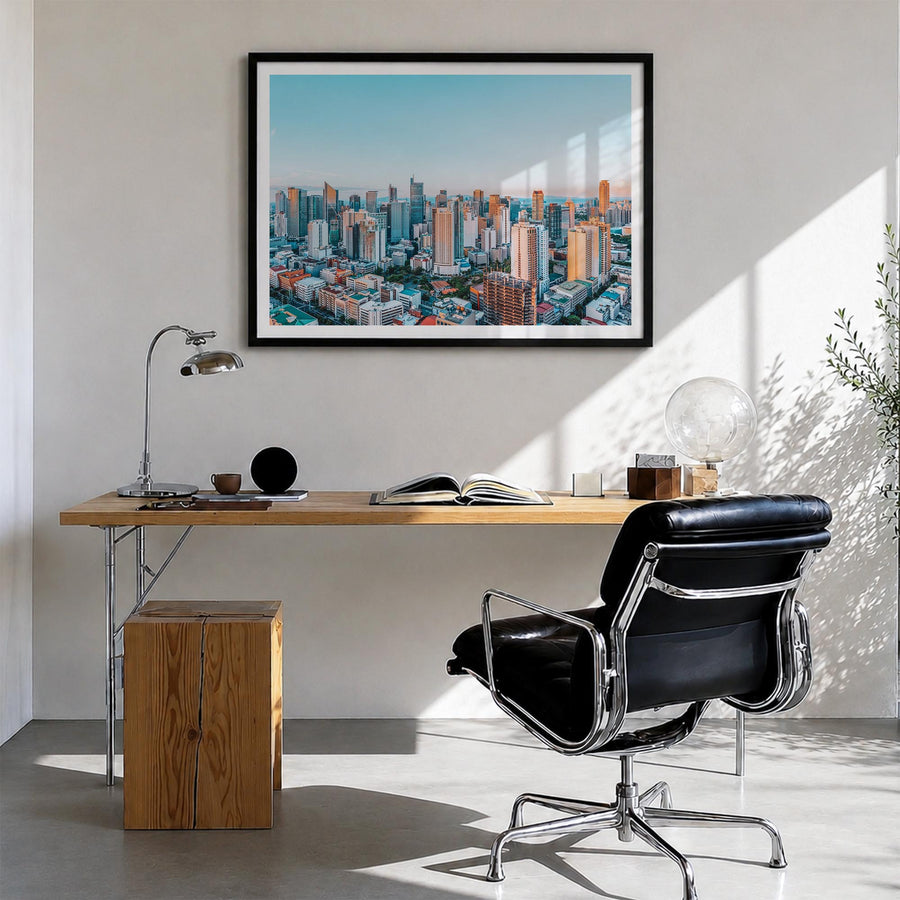 Manila colorful photo poster of Philippines – horizontal wall art in black wood frame with white border, hanging on wall