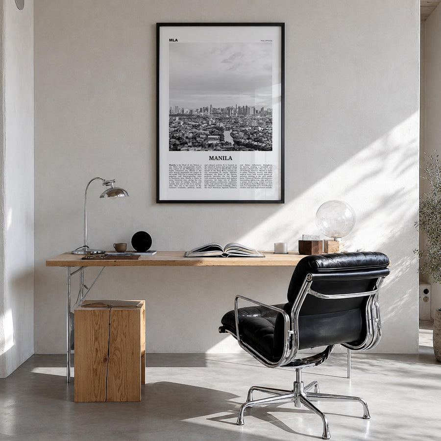 Manila no. 2 black & white newspaper poster of Philippines – vertical wall art in black wood frame, hanging on wall