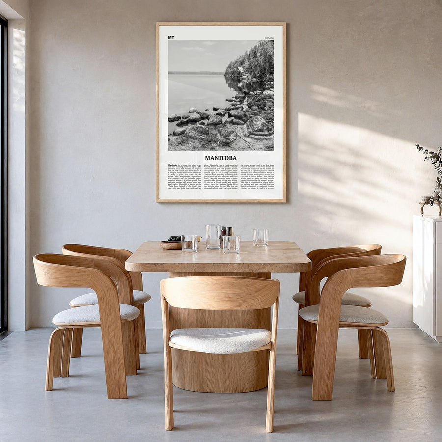 Manitoba Newspaper Poster in a natural wood frame, hanging in a dining room