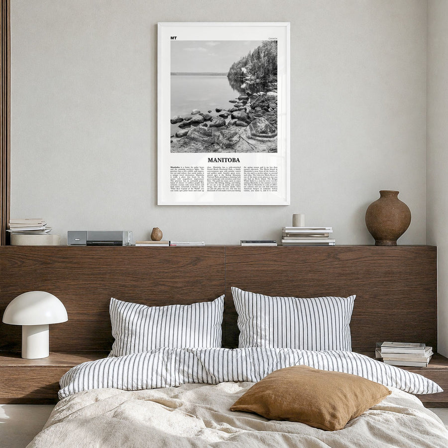 Manitoba Newspaper Poster in a white wood frame, hanging in a bedroom