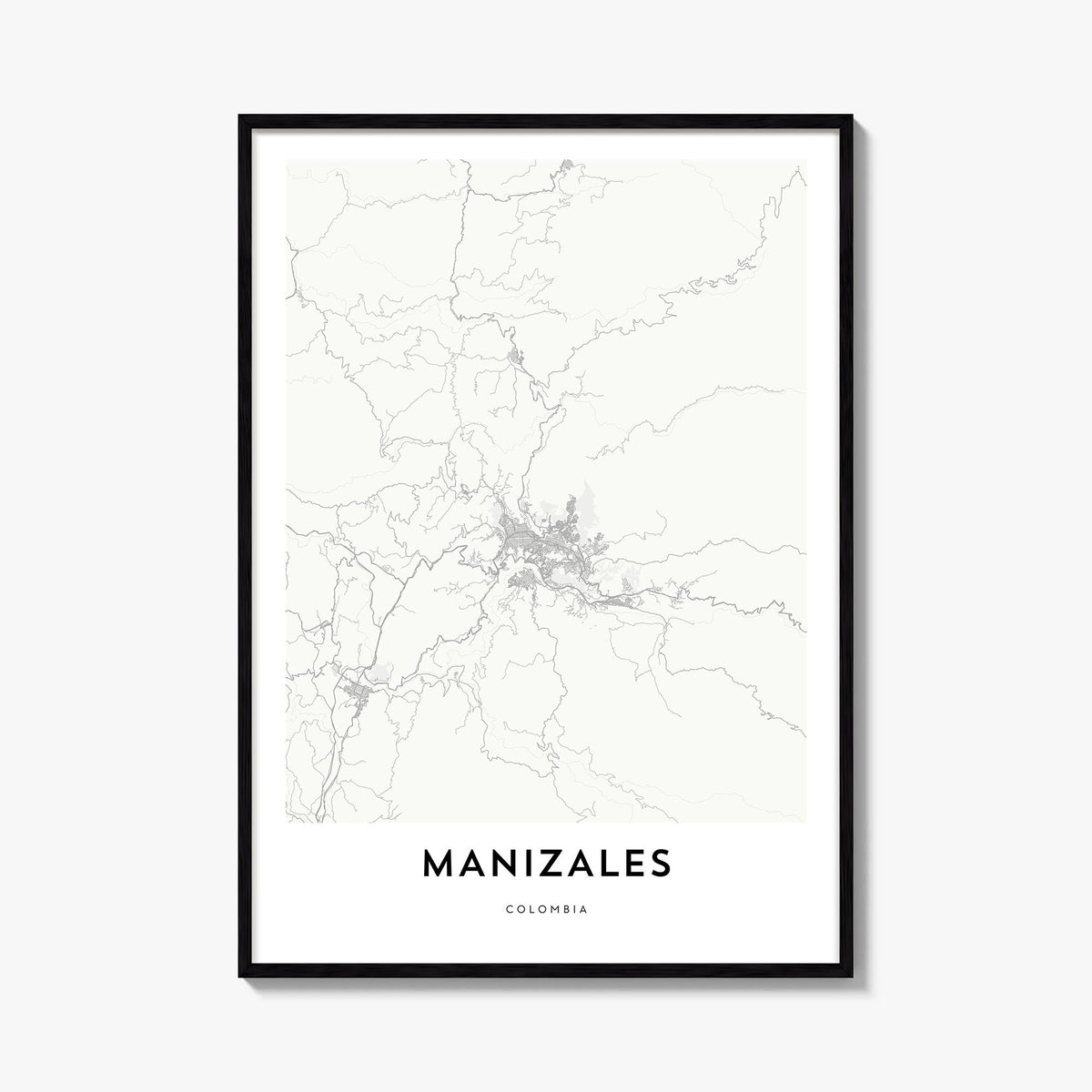 Manizales black & white map poster of Colombia – vertical wall art, unframed print shown in interior mockup