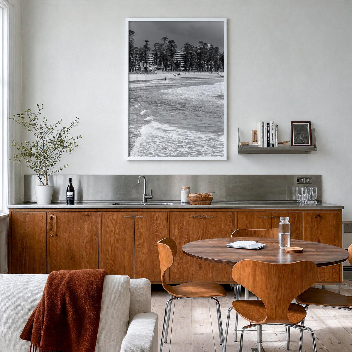 Manly Beach black & white photo poster of Sydney, New South Wales – vertical wall art in white wood frame, hanging on wall