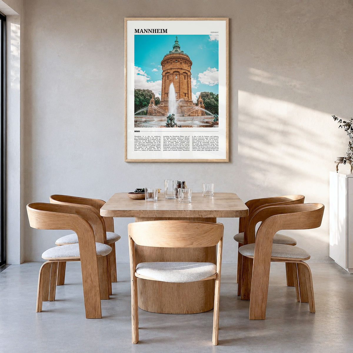 Mannheim Travel Poster in a natural wood frame, hanging in a dining room