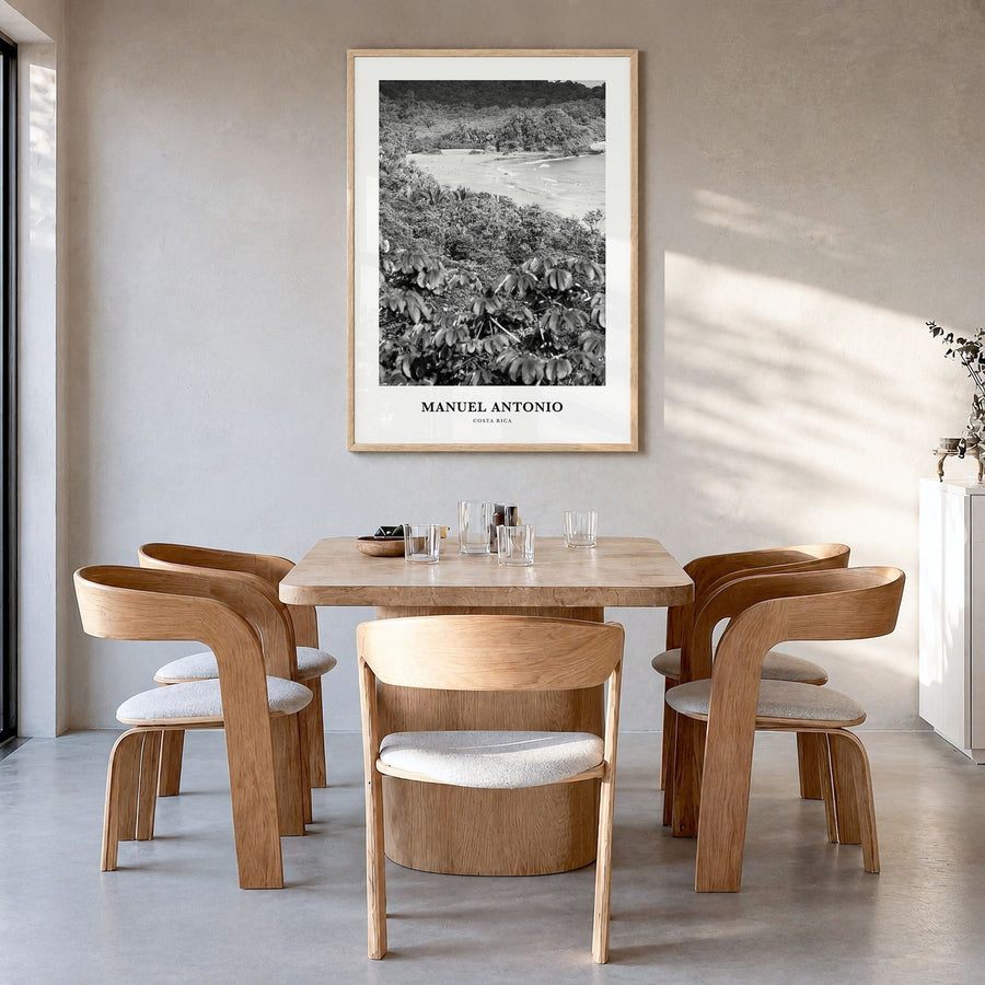 Manuel Antonio National Park Classic Poster in a natural wood frame, hanging in a dining room