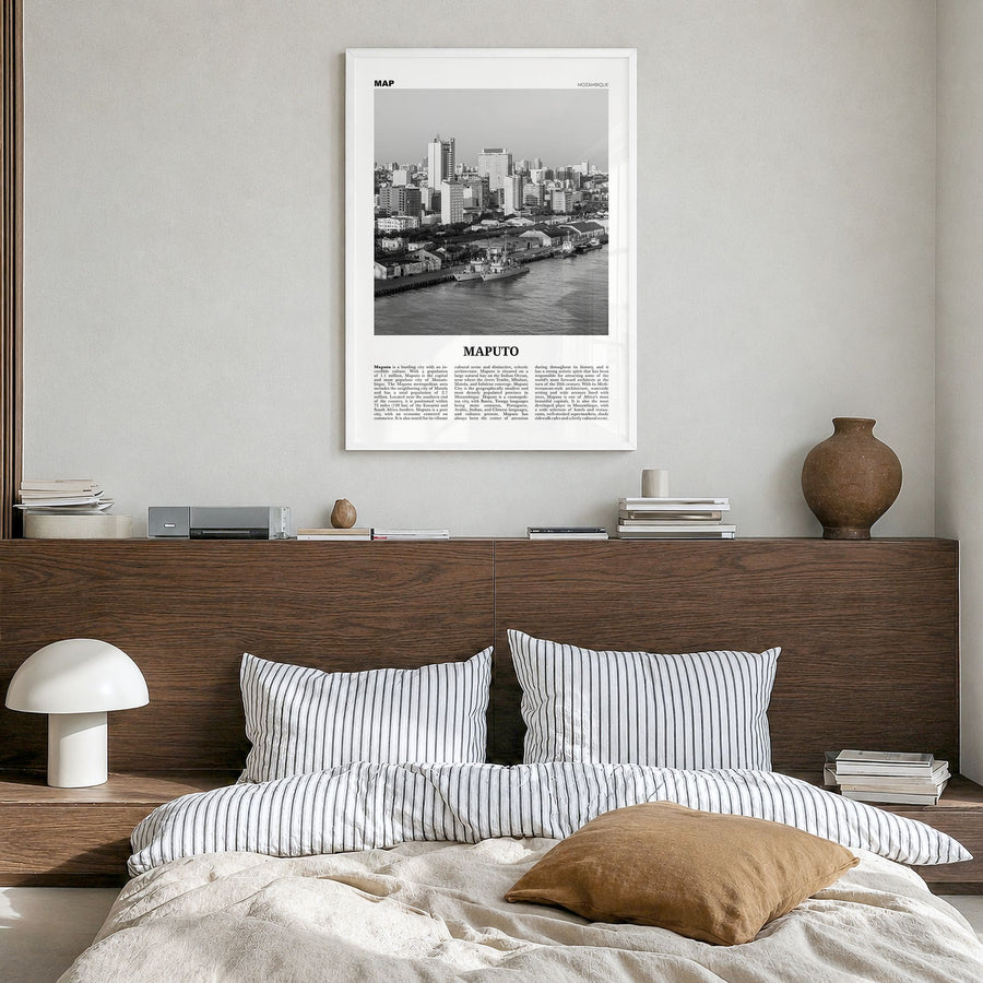 Maputo Newspaper Poster in a white wood frame, hanging in a bedroom